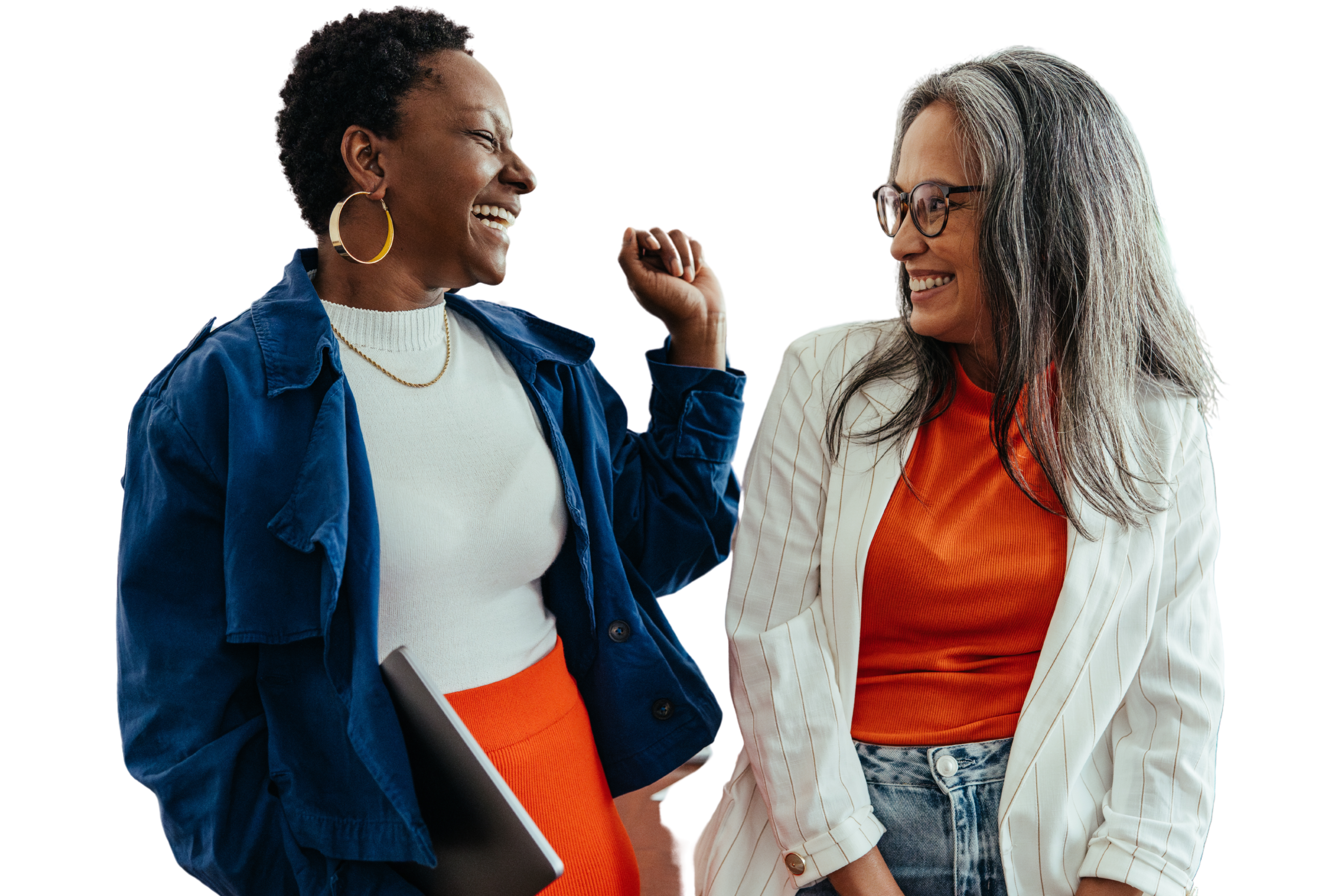 women talking Creative colleagues laughing in a vibrant and colorful workplace